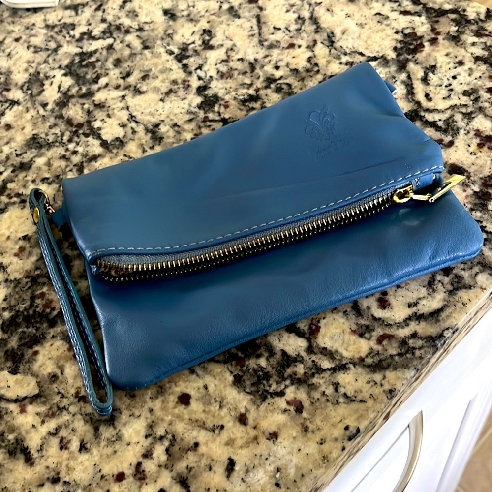 Blue genuine leather clutch bag.